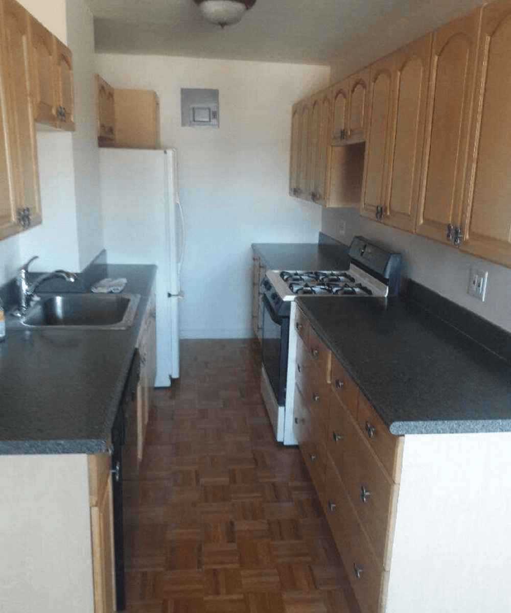 Professional masking and protection protocol for kitchen cabinet refinishing.